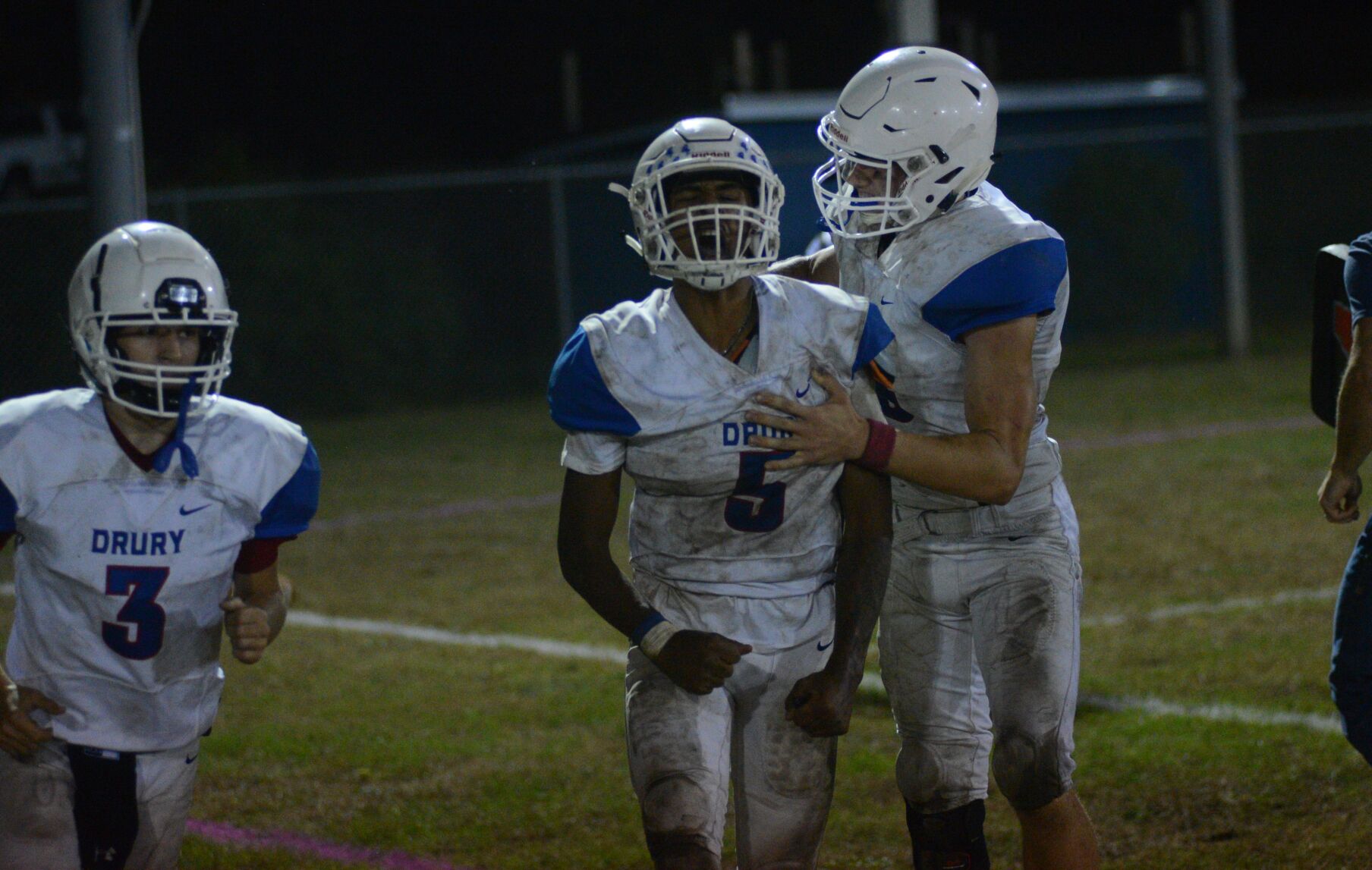 Guilotte and Brazeau celebrate touchdown run.